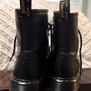 Zavala Snake Embossed leather boot in black. Dr. Martens